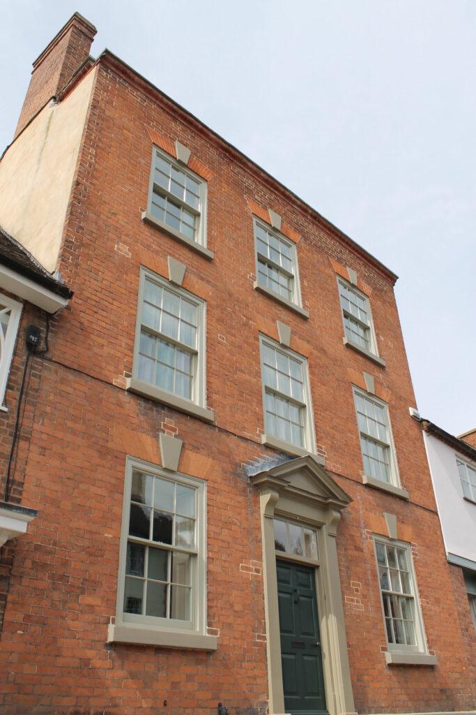 Grade II listed Georgian townhouse in Ludlow with double glazed box sash windows, for which we received a heritage award (right)