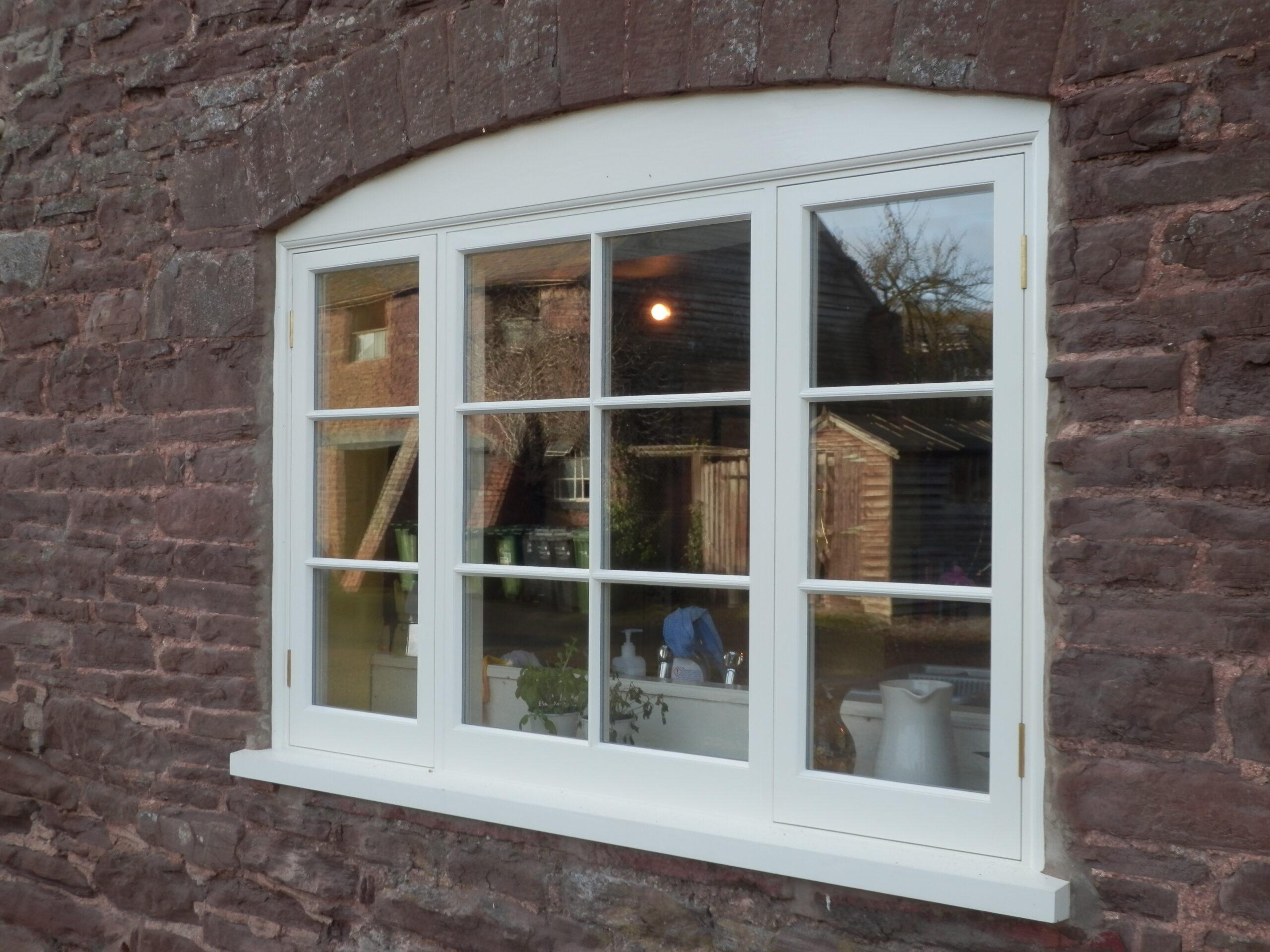 Casement window painted white.